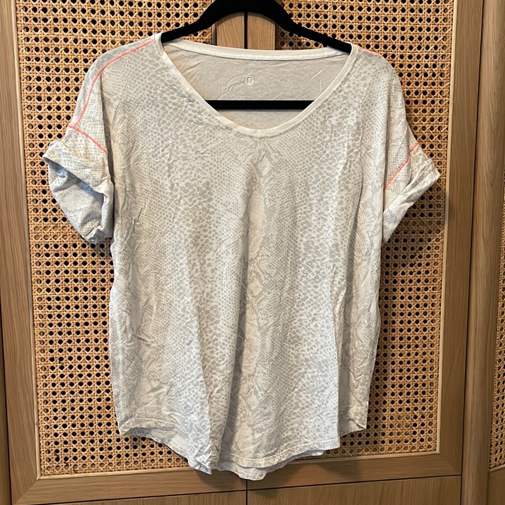 Lululemon white/grey/pink snake print short sleeve top (size 10)